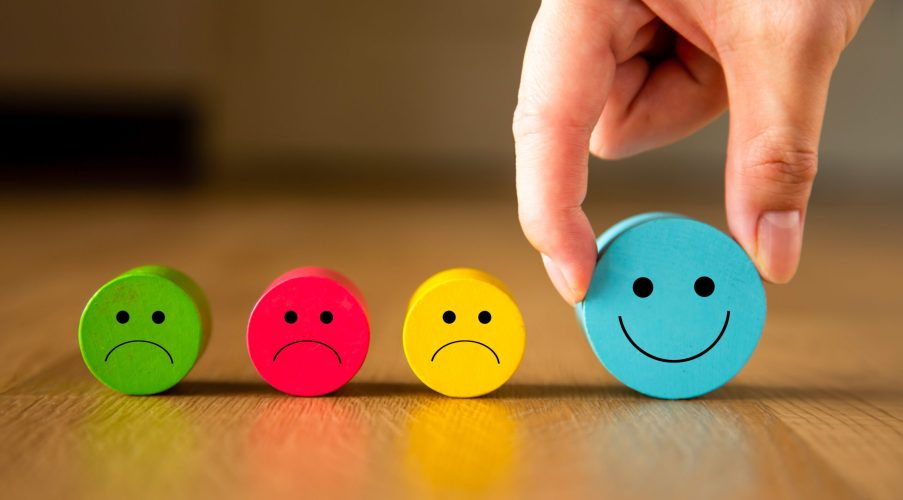 Customer service evaluation and satisfaction survey concepts. The client hand picked the happy face smile icon.